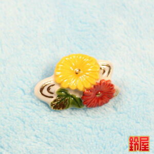 健康長寿の開運グッズである菊水のピンブローチ2
